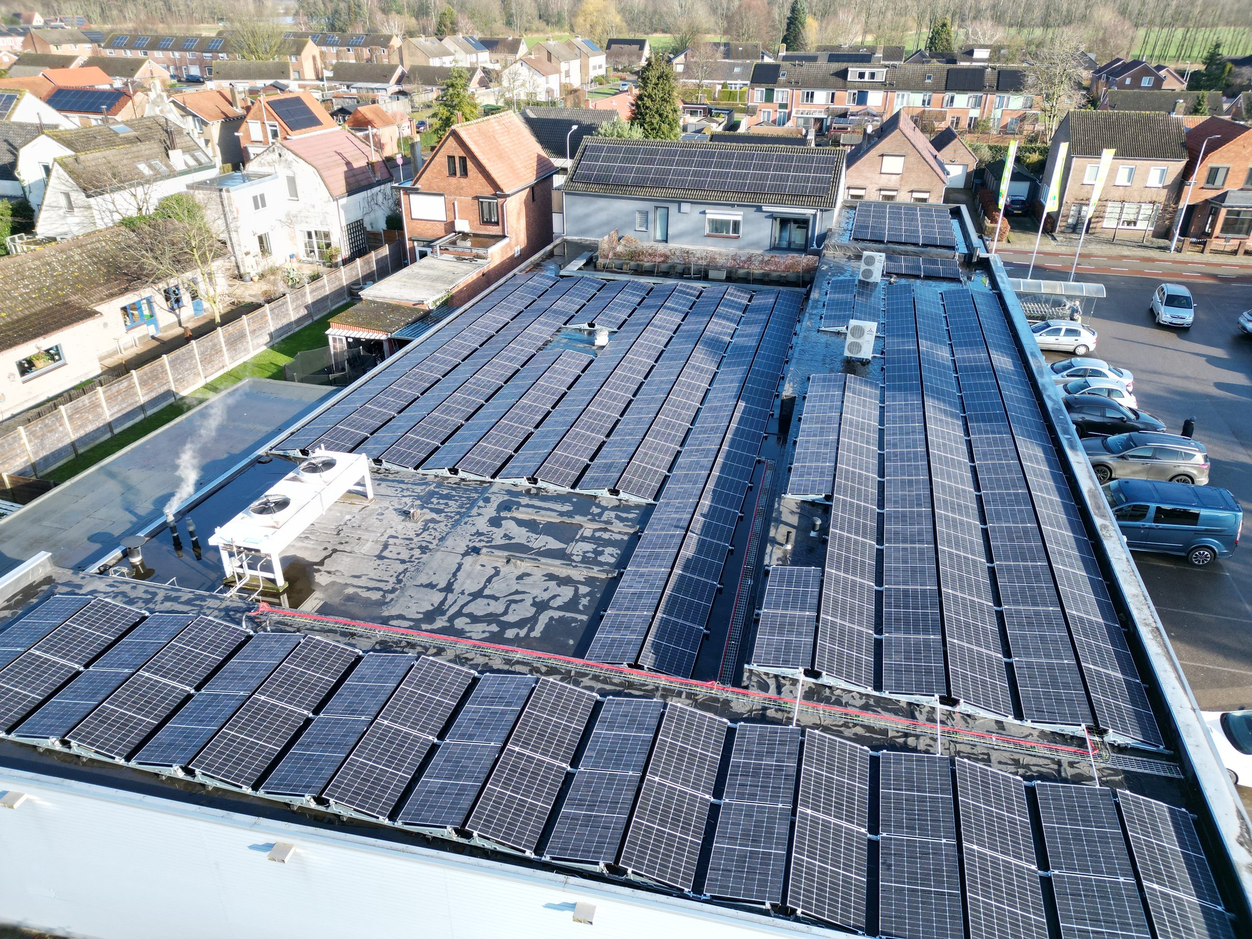 320 solar panels installed on the roof of a supermarket as part of a sustainability project